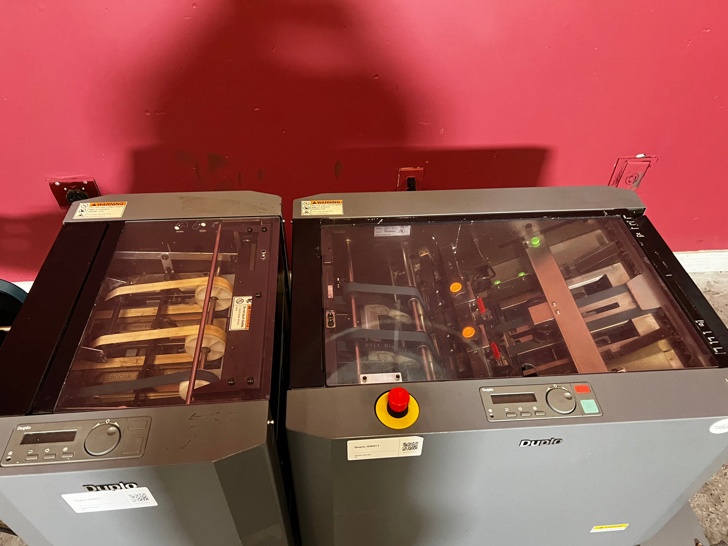 Used Duplo DBM-120 booklet maker with trimmer top-down view of feed and fold section – AA&D PressExchange