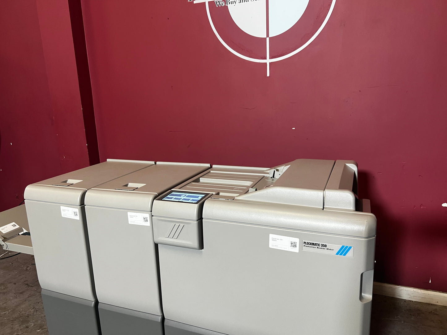 Used Plockmatic 350 64k meter booklet maker showing paper feed and trimming section – AA&D PressExchange