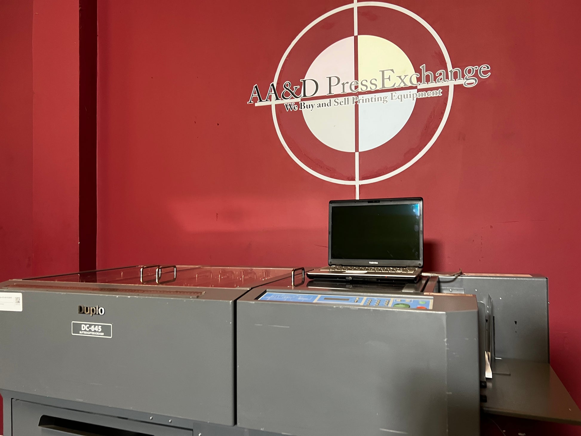Used Duplo DC-645 Slitter Cutter Creaser front view highlighting digital finishing capabilities – AA&D PressExchange