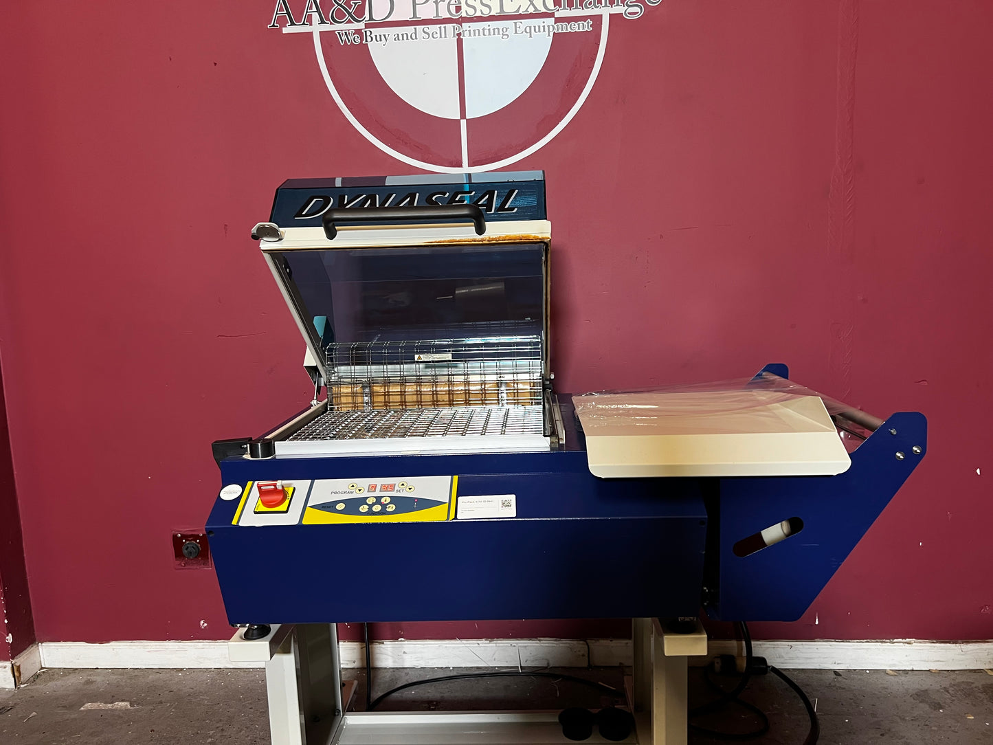 Used Dynaseal Shrink Wrapper side view showing shrink tunnel – AA&D PressExchange