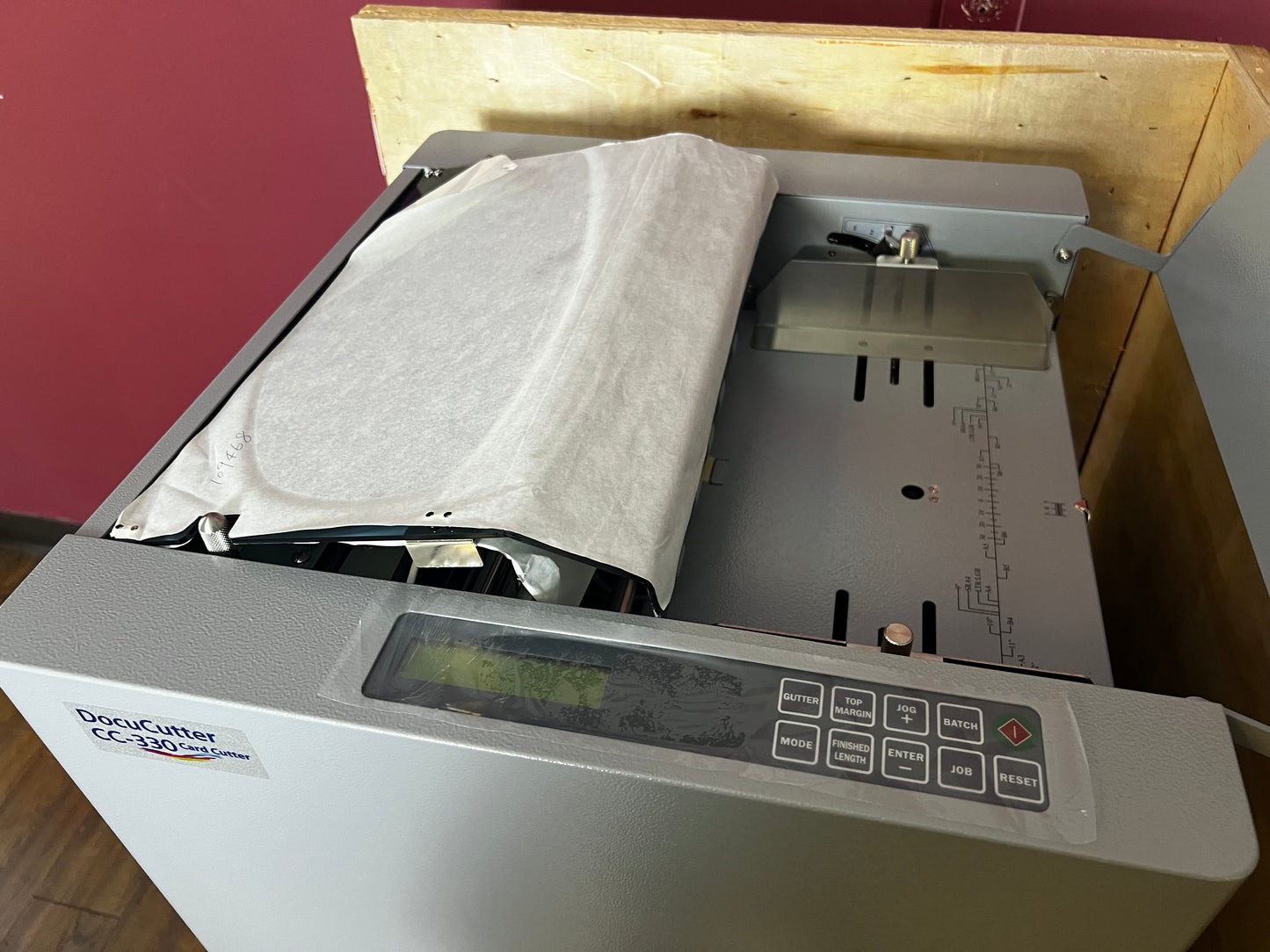 AA&D PressExchange Used Duplo CC-330 Card Cutter with waste bin for easy disposal of trimmings
