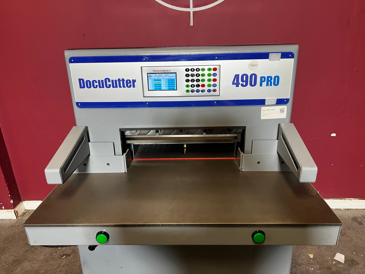 AA&D PressExchange Used Duplo 490 PRO hydraulic paper cutter close-up of blade and safety guard
