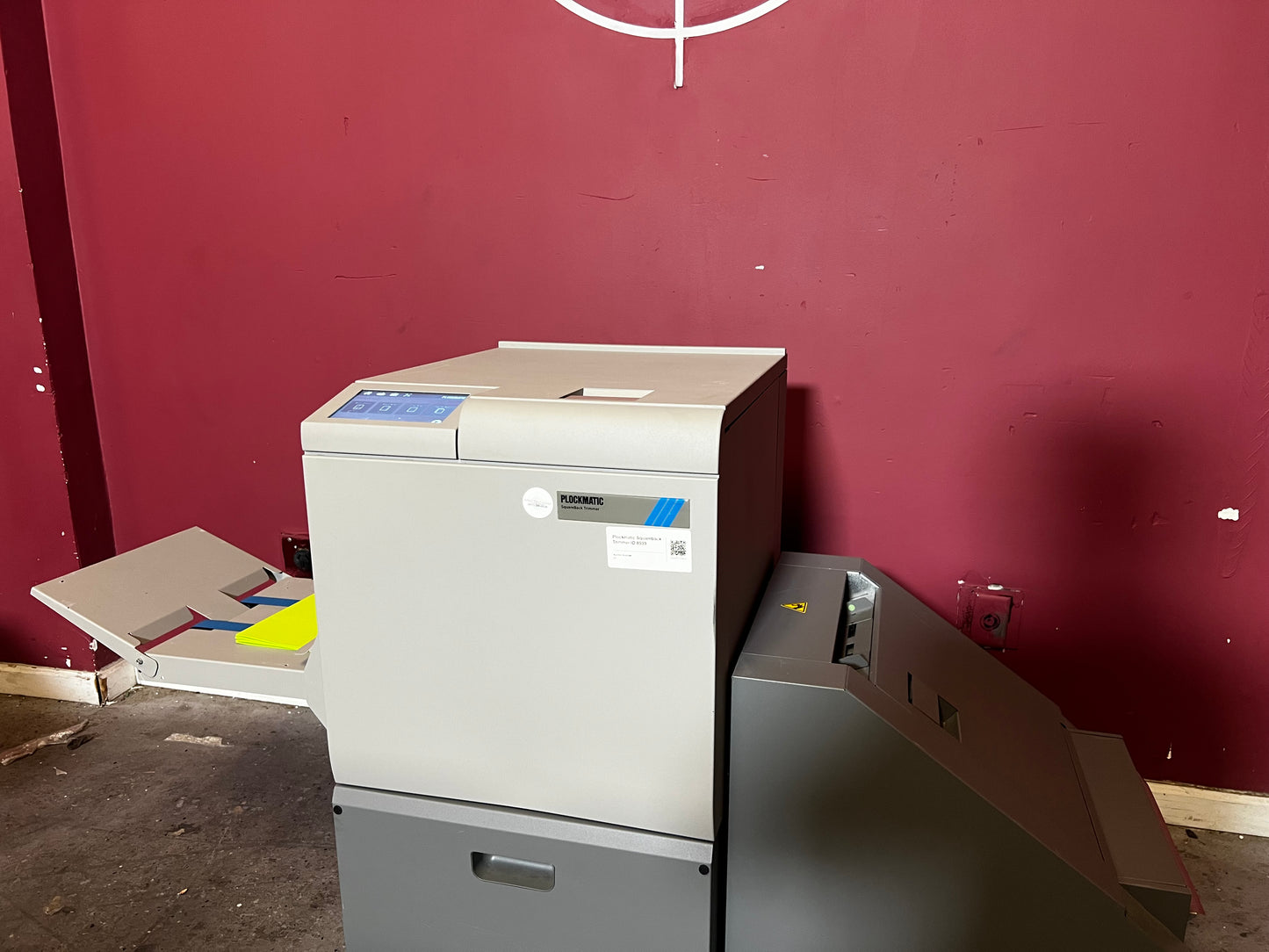 Used Plockmatic SquareBack Trimmer detailed view of internal trimming and spine forming units – AA&D PressExchange
