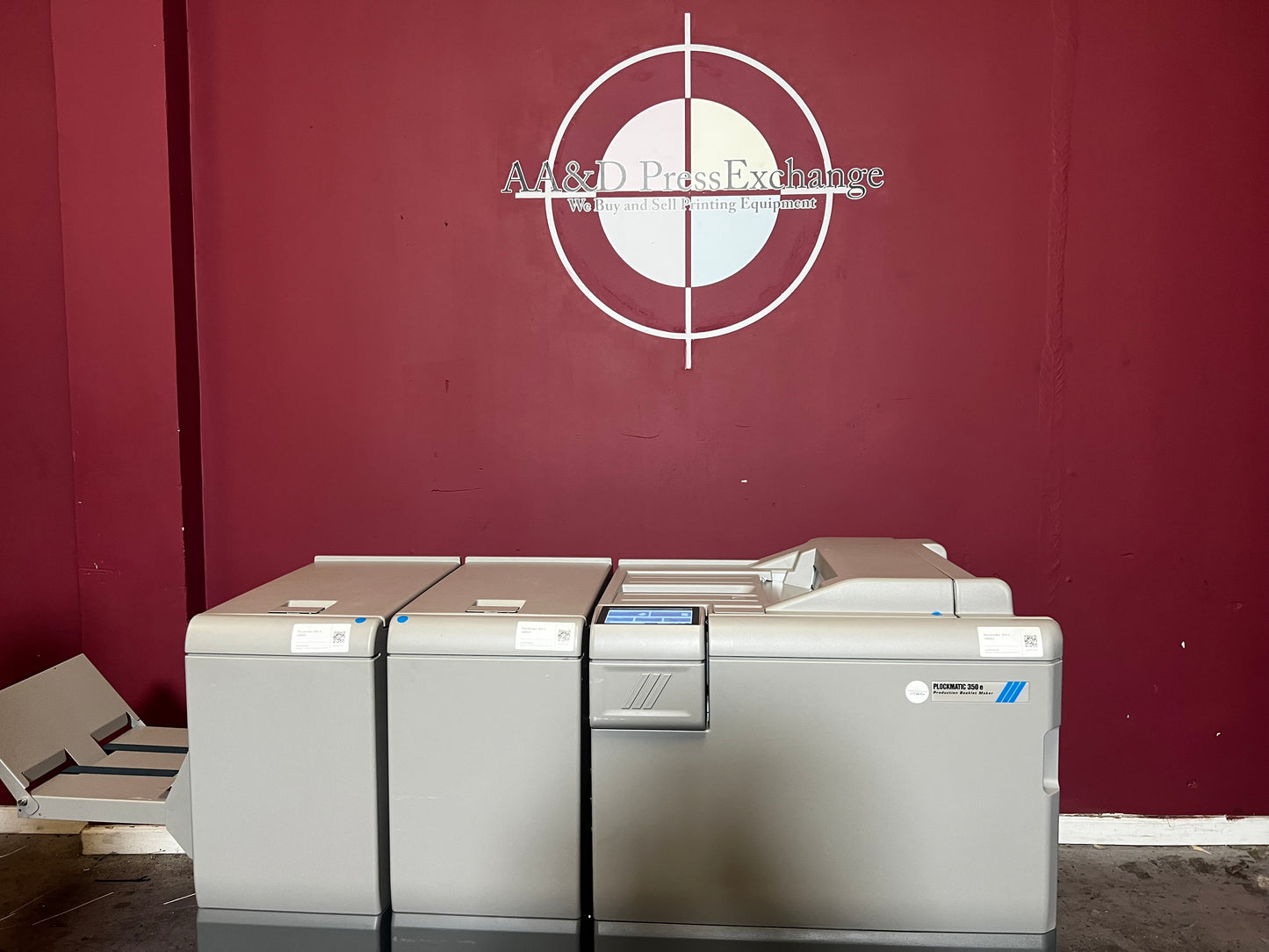 Used Plockmatic 350e booklet maker 120k meter front view in Ricoh Pro inline setup – AA&D PressExchange