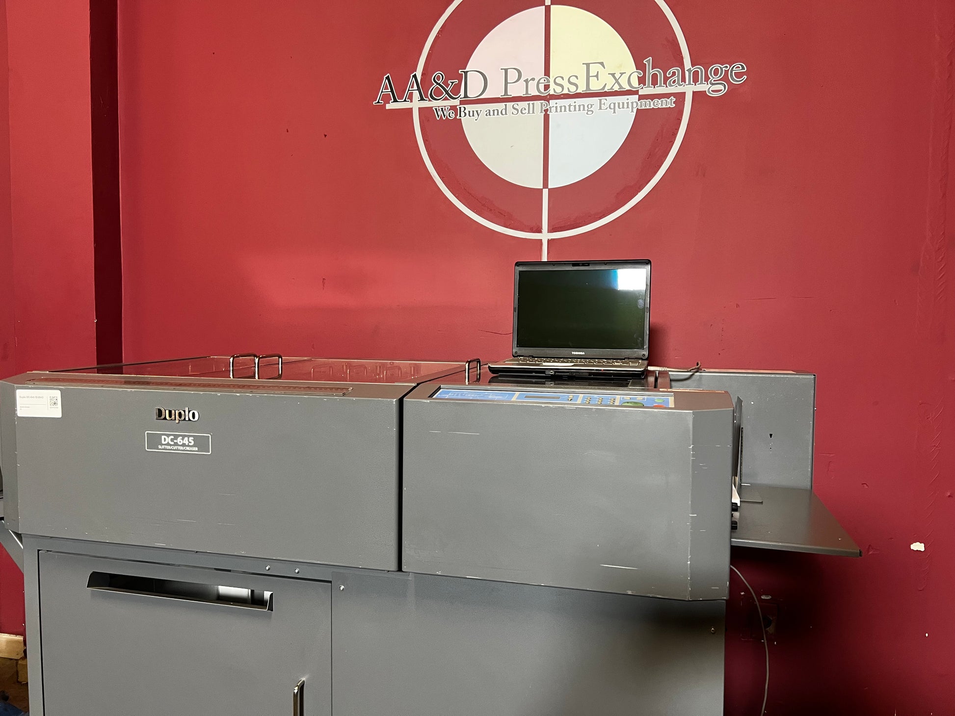 Used Duplo DC-645 Slitter Cutter Creaser side view with barcode reader for automatic job setup – AA&D PressExchange
