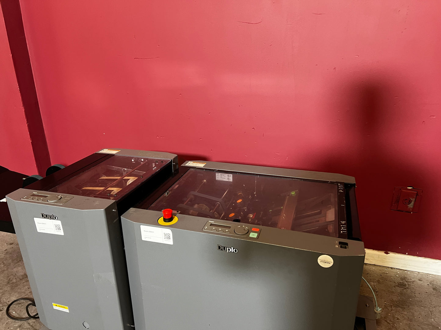 Used Duplo DBM-120 booklet maker with trimmer side/angled view showing booklet path – AA&D PressExchange