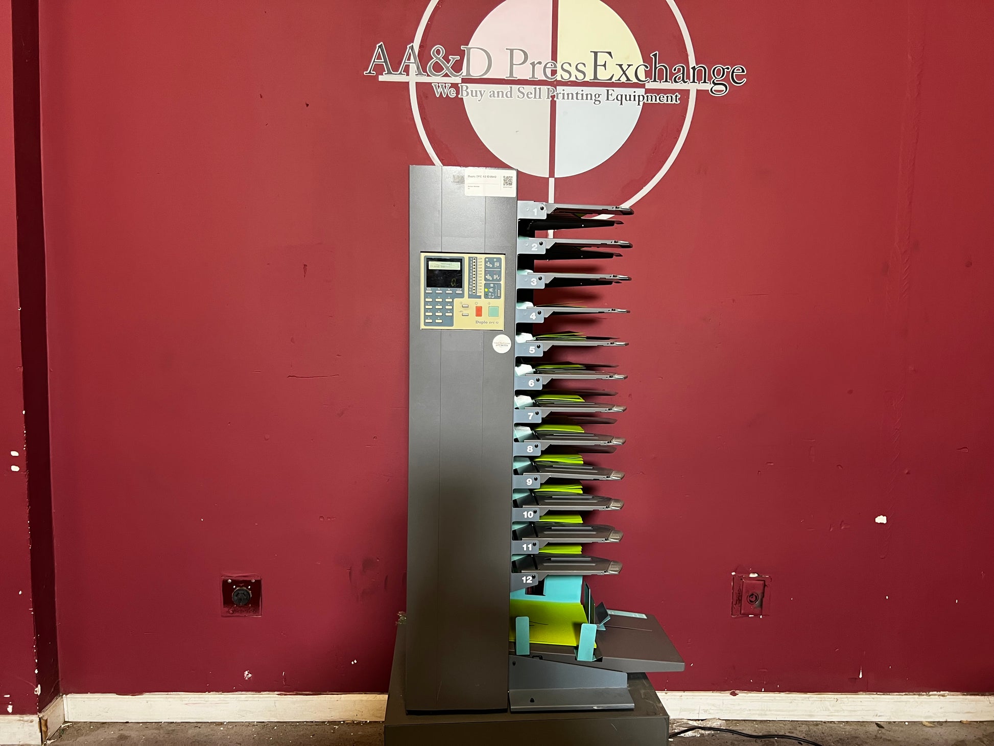 Used Duplo DFC-12 Paper Collator Bin Alignment Close-Up – AA&D PressExchange