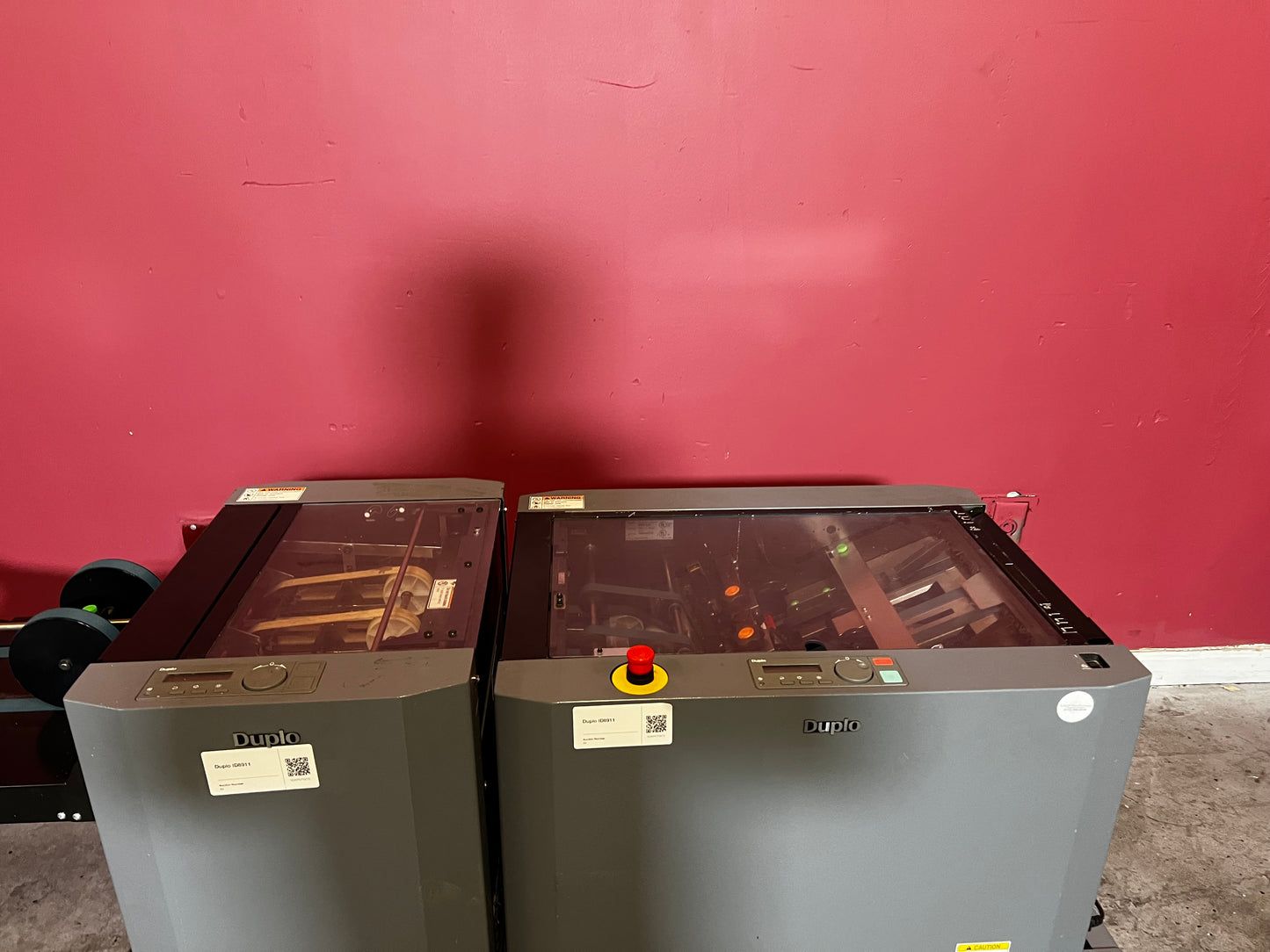Used Duplo DBM-120 booklet maker with trimmer angled view showing booklet output tray – AA&D PressExchange