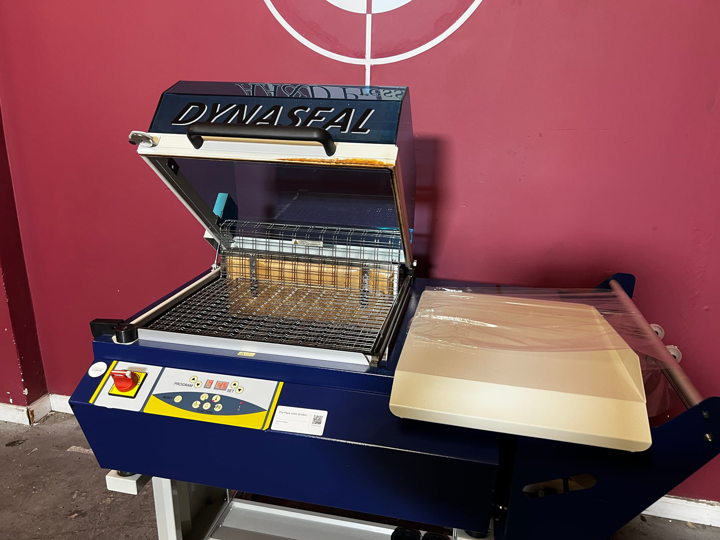 Used Dynaseal Shrink Wrapper industrial shrink packaging machine front view – AA&D PressExchange