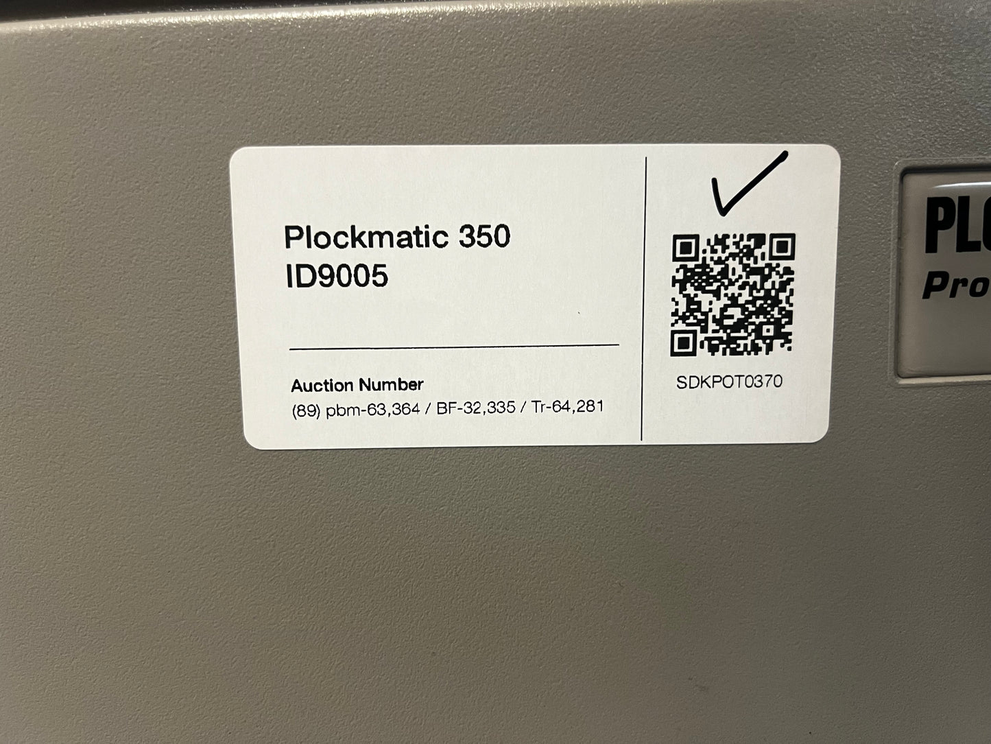 Used Plockmatic 350 64k meter booklet maker showing feed and fold units in production environment – AA&D PressExchange