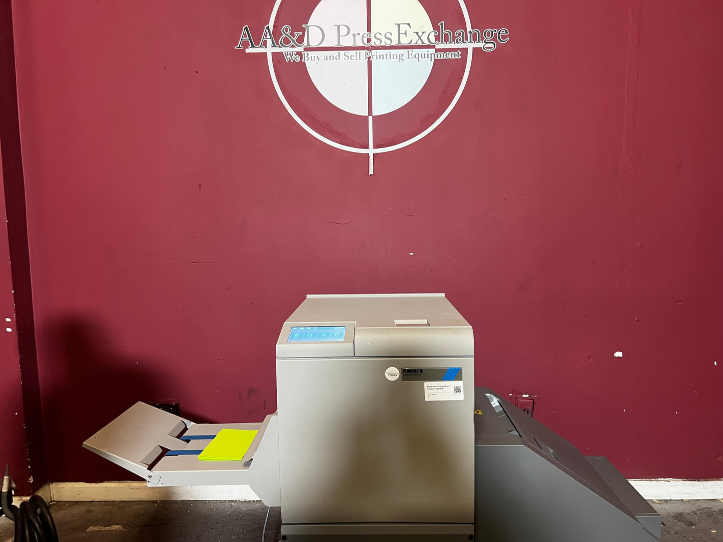 Used Plockmatic SquareBack Trimmer front view showing trimming unit and square spine finish – AA&D PressExchange
