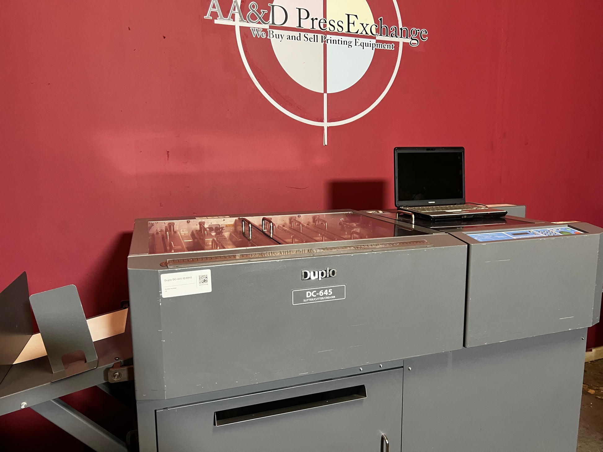 Used Duplo DC-645 Slitter Cutter Creaser angled view of full machine operation – AA&D PressExchange