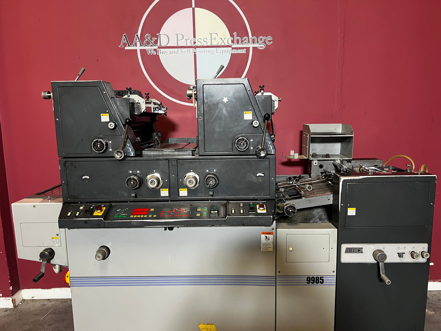 Used AB Dick 9985 dual-color offset printing press side profile – AA&D PressExchange