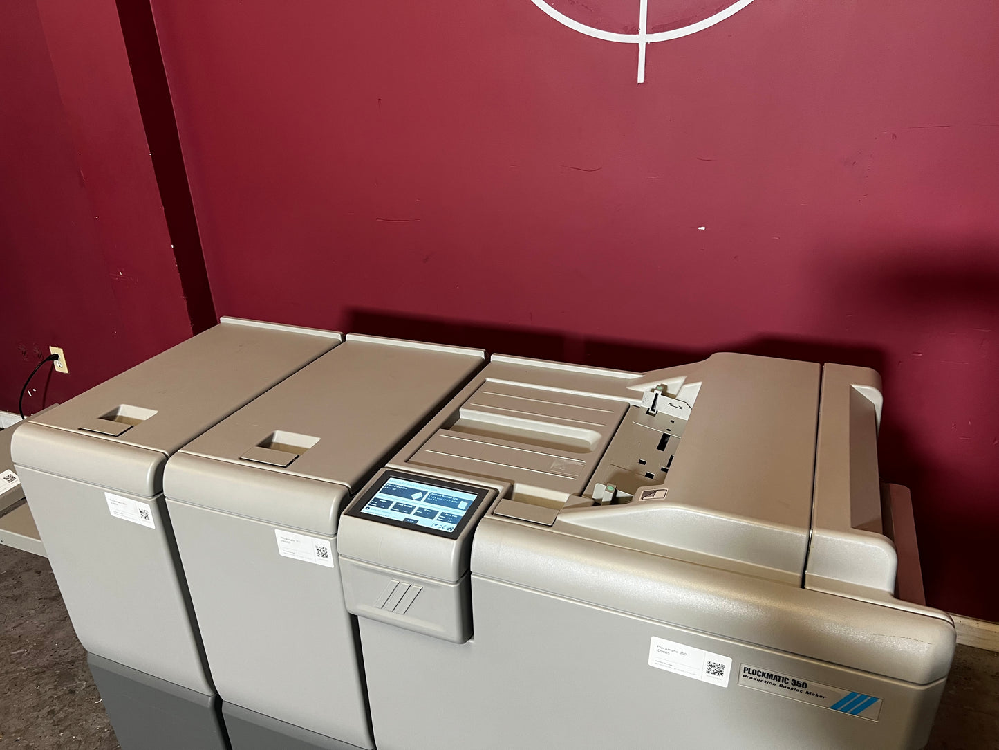 Used Plockmatic 350 64k meter booklet maker close-up of saddle-stitch and fold mechanism – AA&D PressExchange