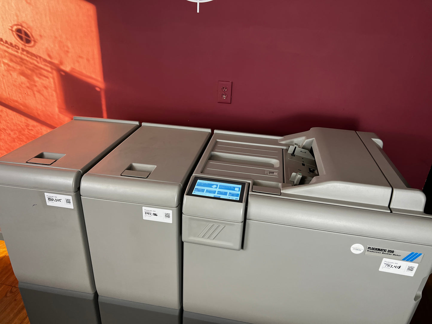 Used Plockmatic 350 booklet maker rear view highlighting saddle-stitch mechanism – AA&D PressExchange