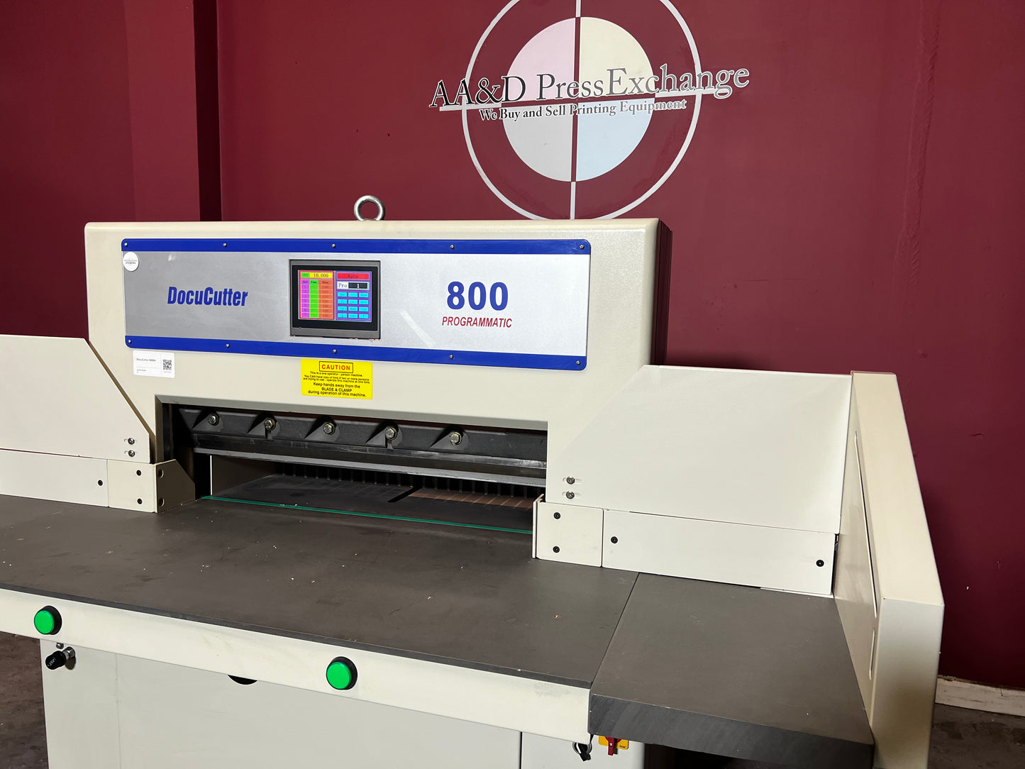 Used Duplo Docucutter 800 Programmatic paper cutter angled view of cutting bed – AA&D PressExchange