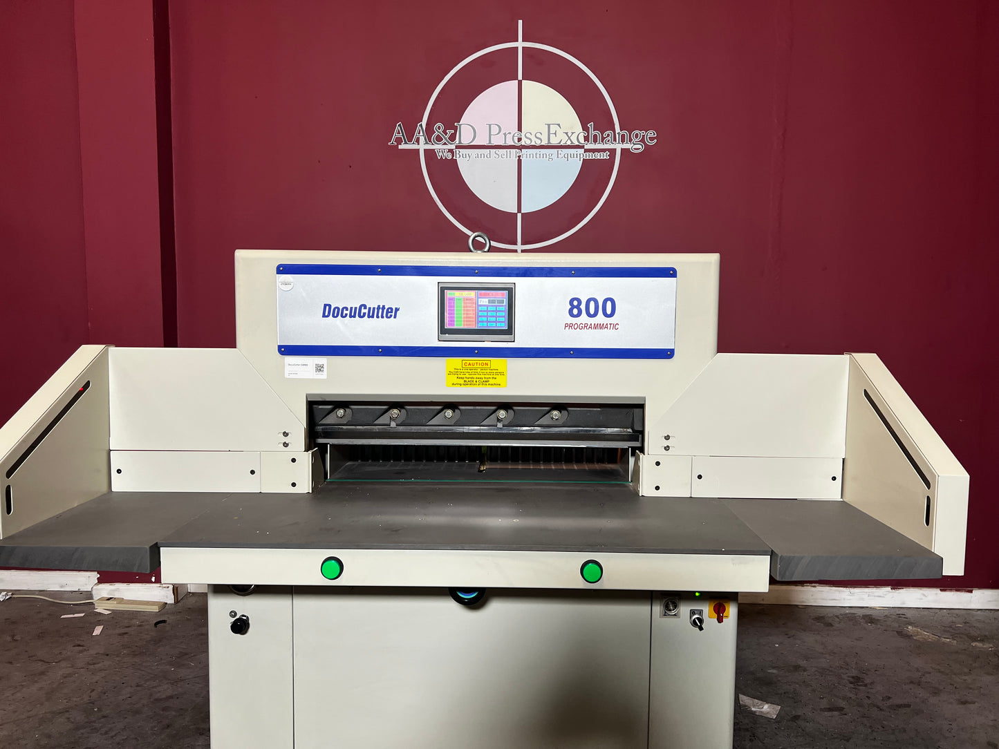 Used Duplo Docucutter 800 Programmatic hydraulic cutter angled rear view with foot pedal – AA&D PressExchange