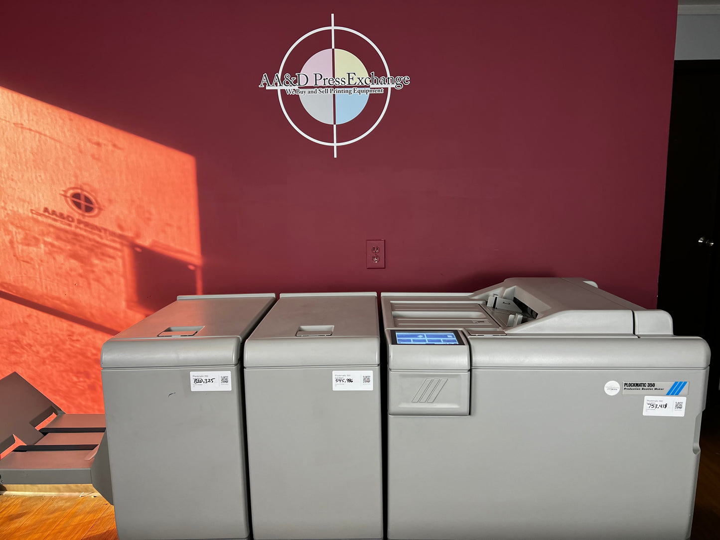 Used Plockmatic 350 production booklet maker rear / side view with paper stock feed – AA&D PressExchange