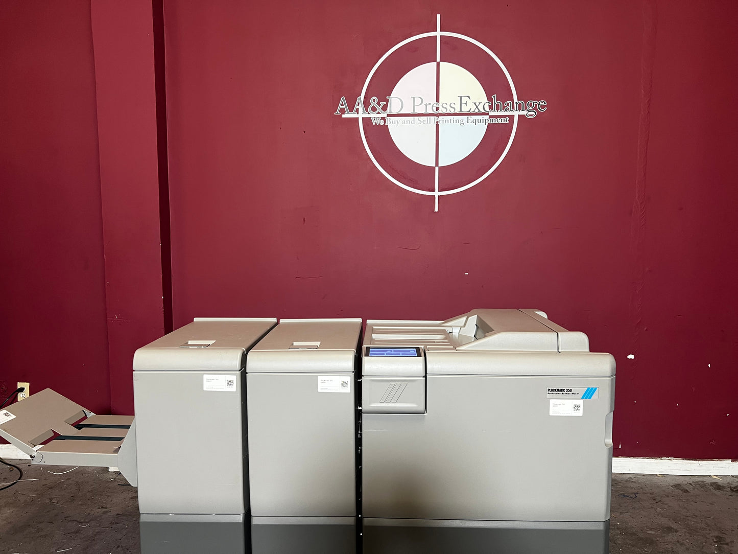 Used Plockmatic 350 booklet maker 60k meter rear view in commercial booklet-making setup – AA&D PressExchange