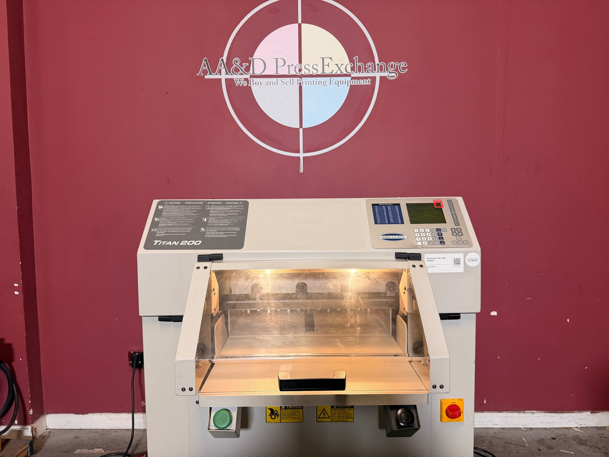 Used Challenge Titan 200 Hydraulic Paper Cutter by AA&D PressExchange, front view showing full machine