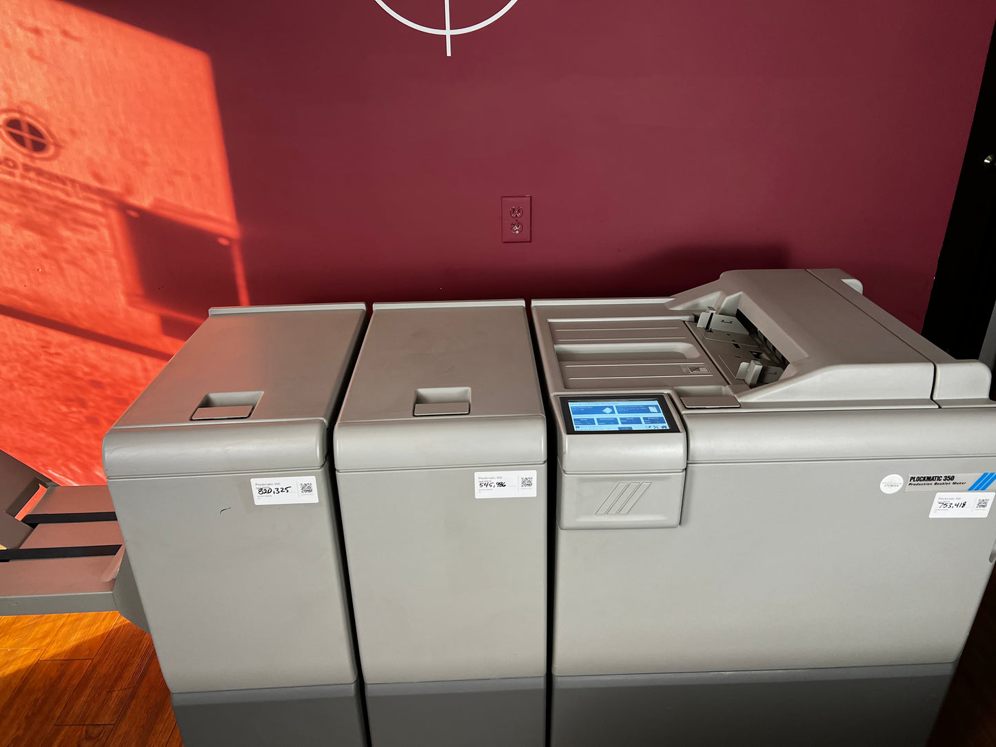 Used Plockmatic 350 booklet maker showing modular components and output tray – AA&D PressExchange