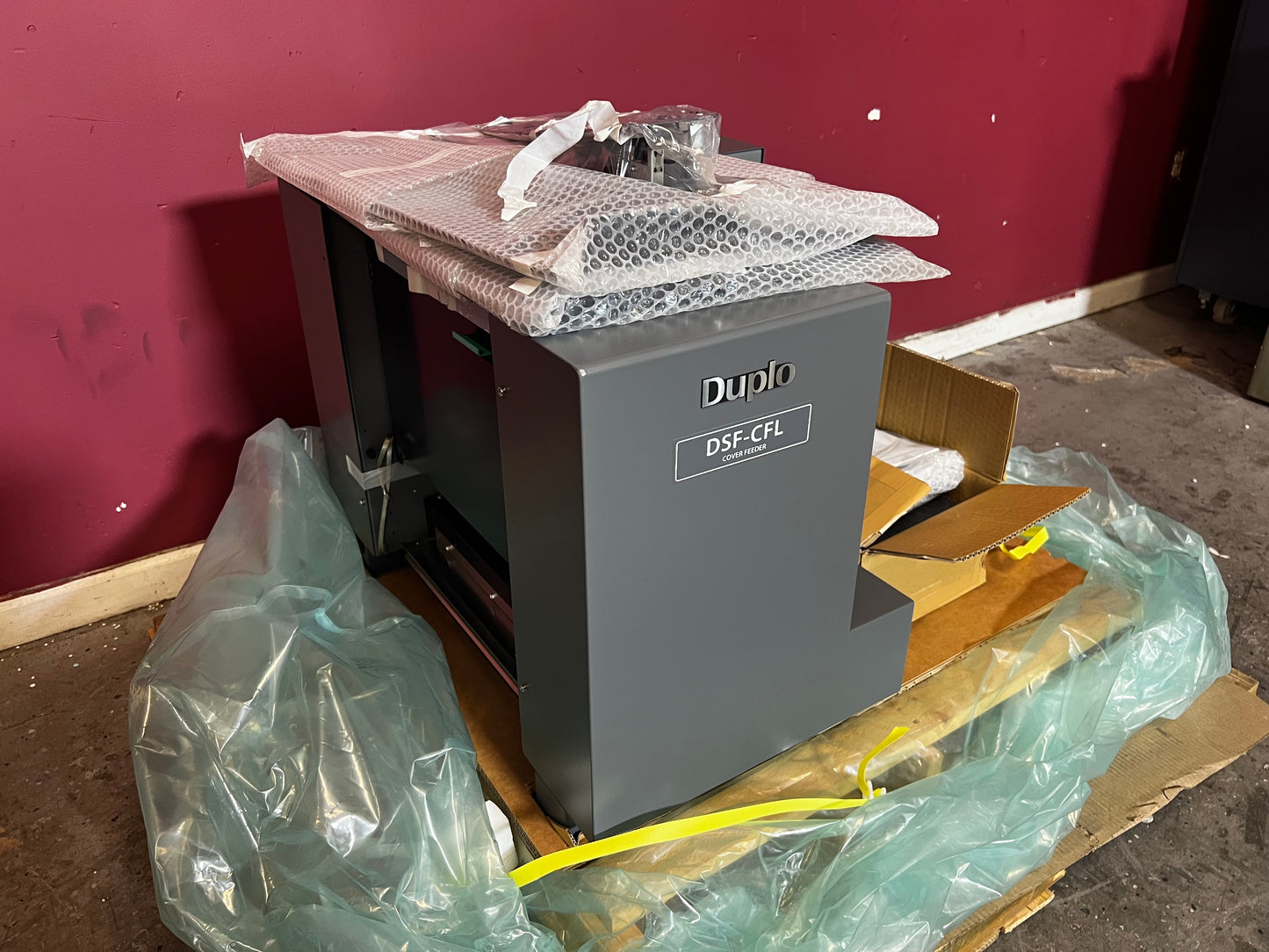 New Duplo DSF-CFL Sheet Cover Feeder angled display – AA&D PressExchange