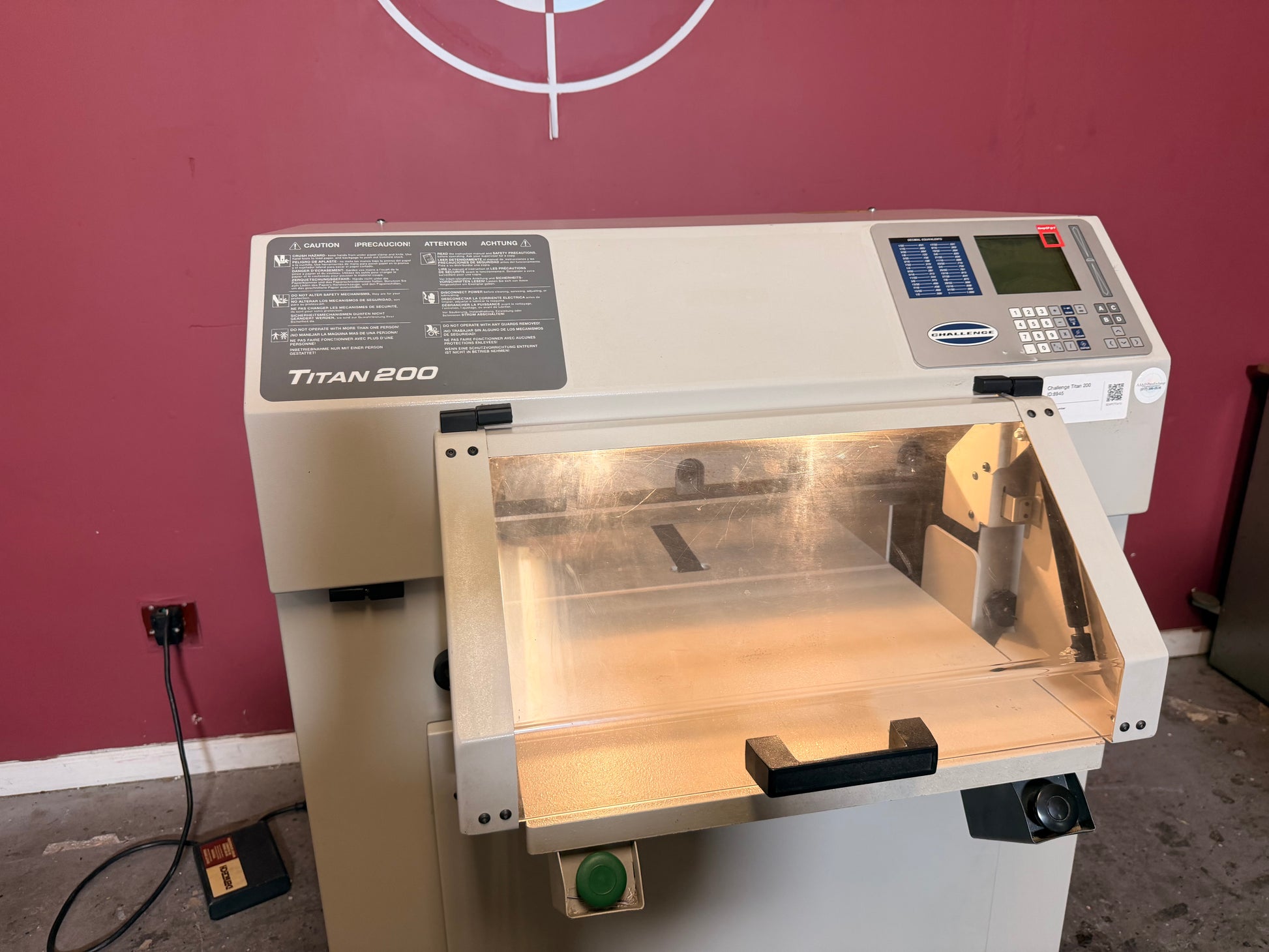 Used Challenge Titan 200 Hydraulic Paper Cutter by AA&D PressExchange, detailed view of powered blade mechanism
