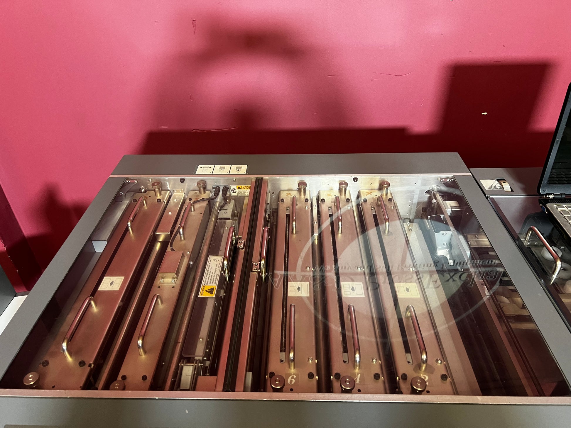 Used Duplo DC-645 Slitter Cutter Creaser rear view showing output stacker and finishing area – AA&D PressExchange