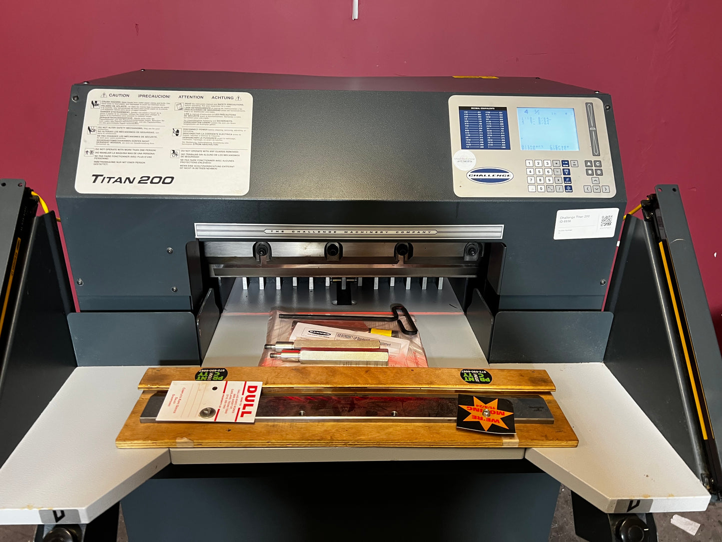 Used Challenge Titan 200C hydraulic paper cutter angled side view showing back gauge – AA&D PressExchange