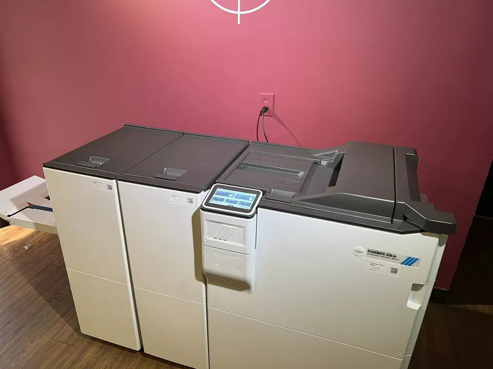 Used Plockmatic 350-m LOW METER 125K booklet maker close-up of stitching and folding section – AA&D PressExchange