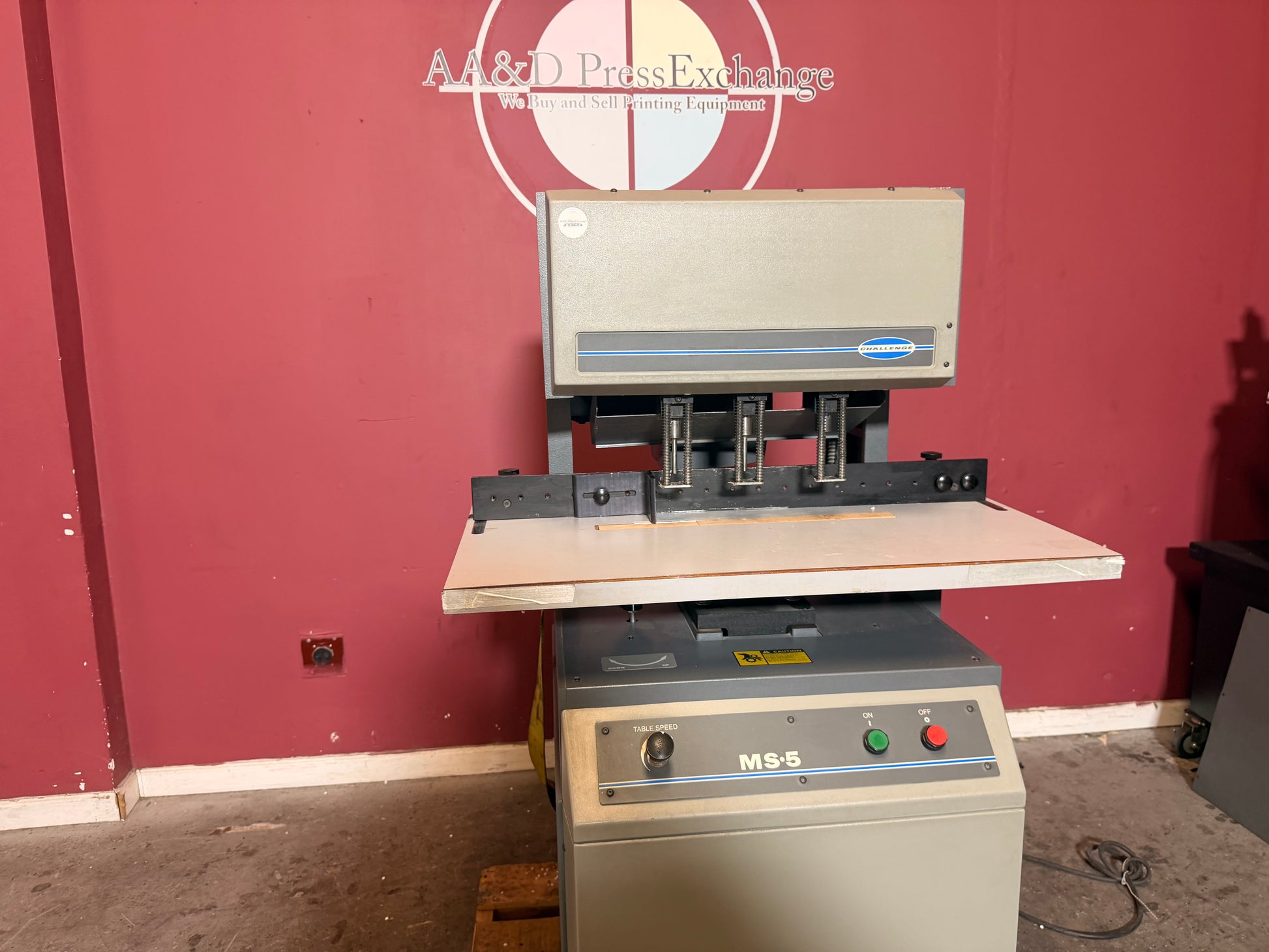 Used Challenge MS-5 hydraulic paper drill for sale showing multi spindle drill head assembly