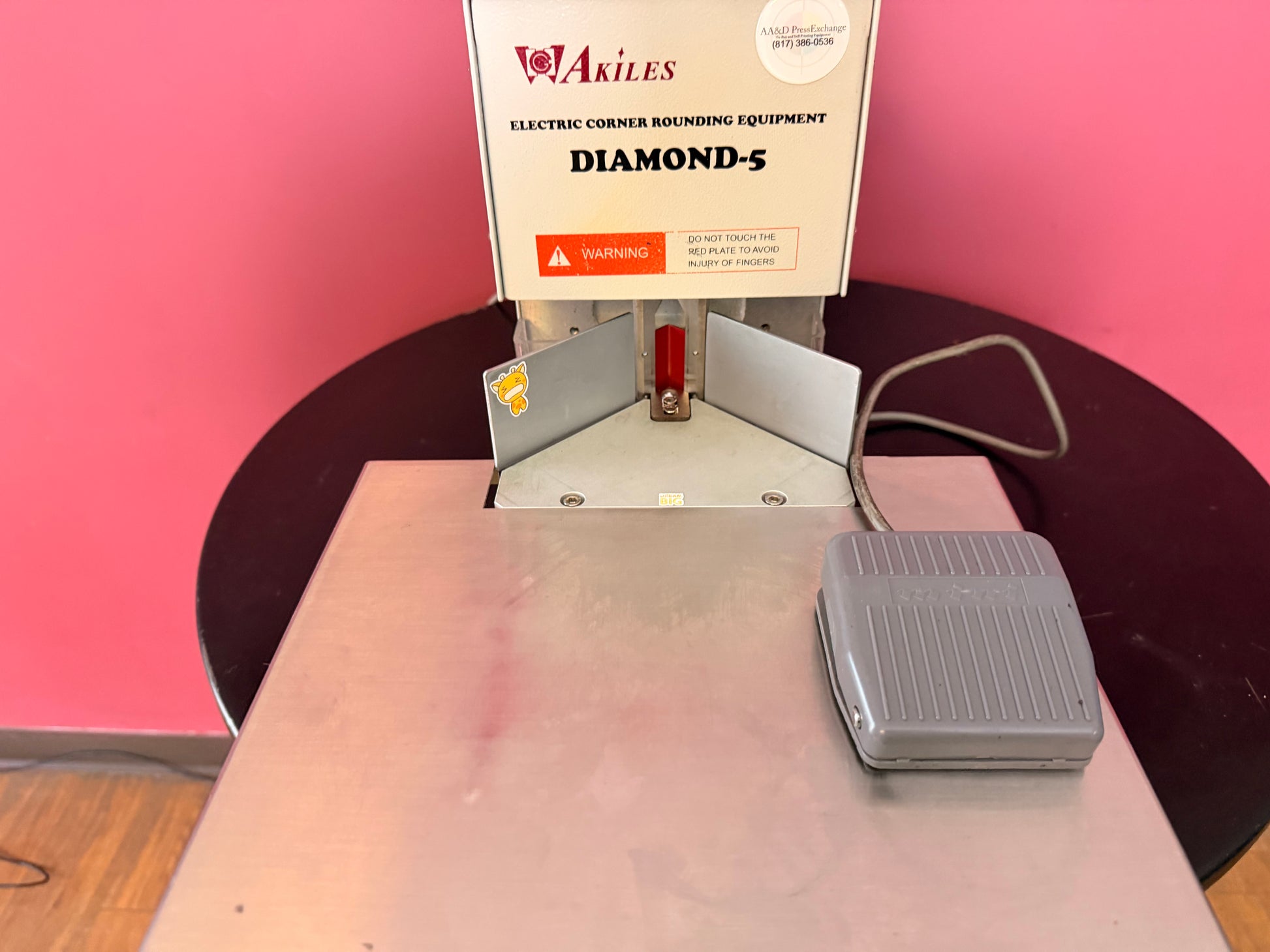 Used Akiles Diamond-5 corner rounder close-up of cutting head and die slot – AA&D PressExchange