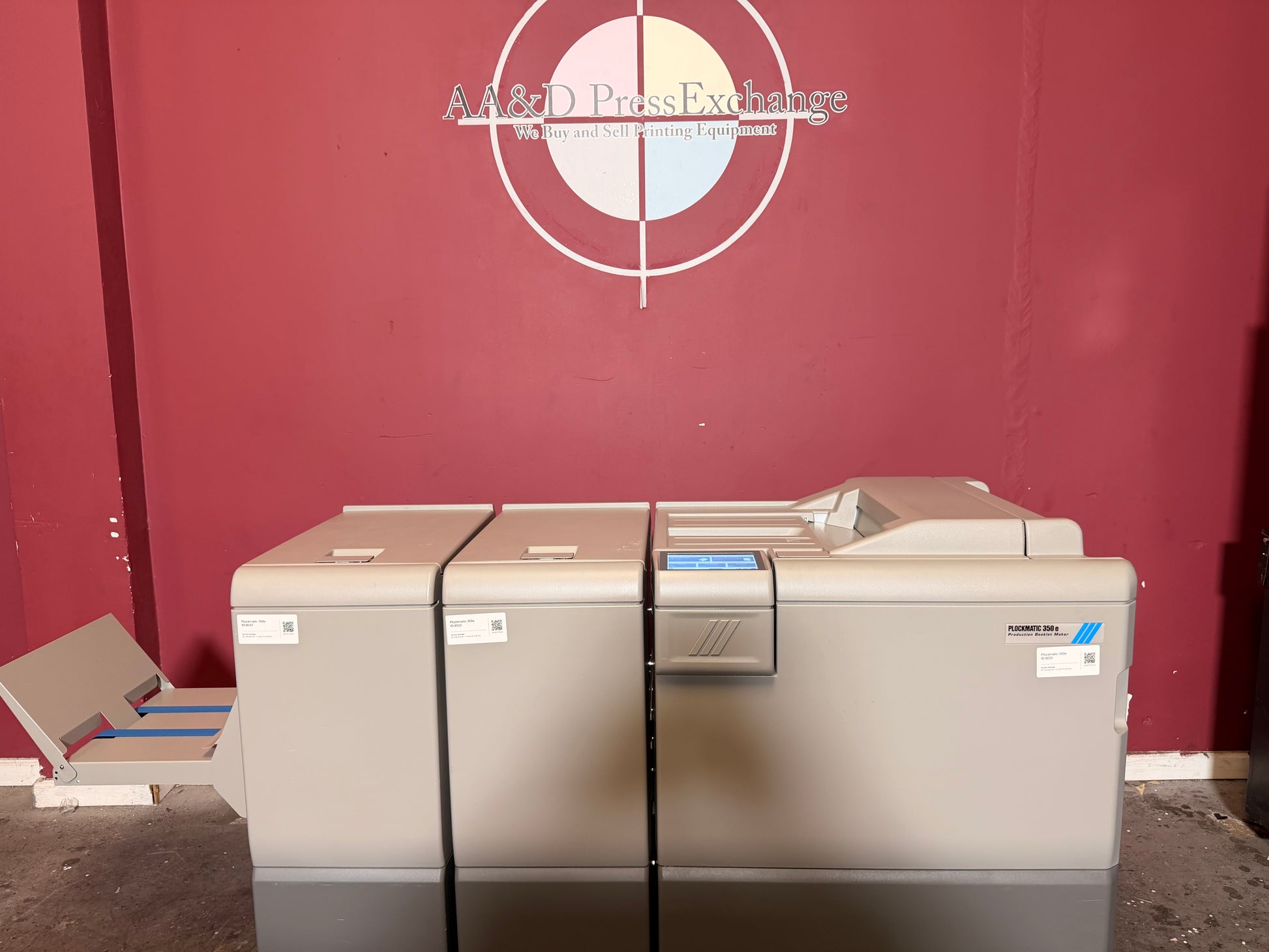 Used Plockmatic 350e booklet maker feeder and control panel close-up