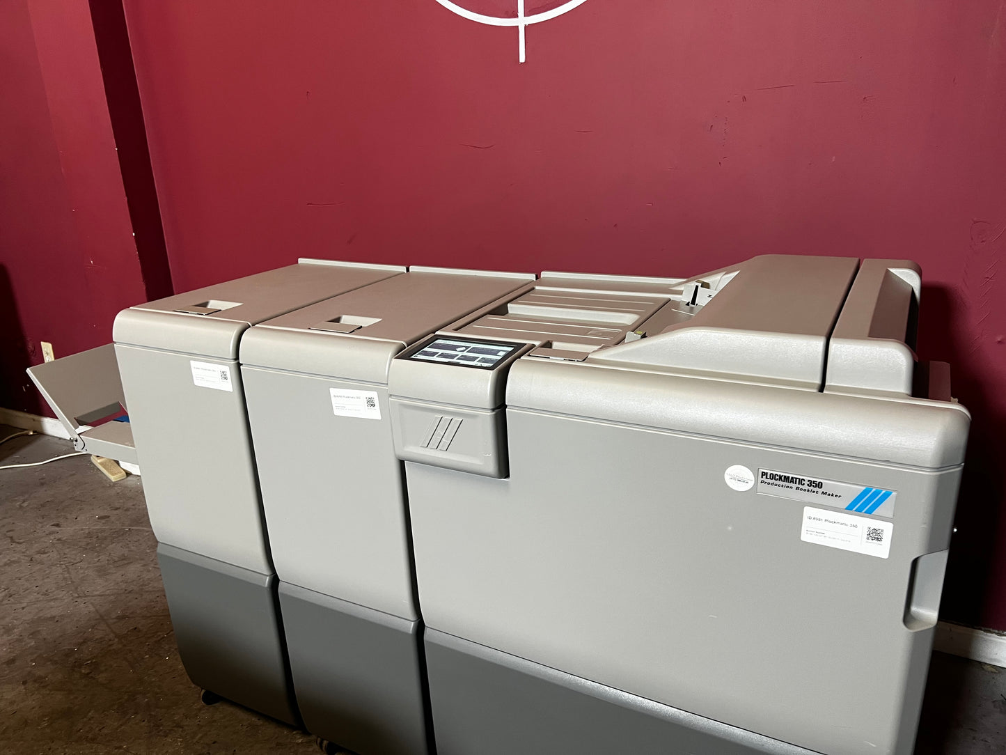 Used Plockmatic 350 bookletmaker LOW METER 167k side view of trim and finishing section – AA&D PressExchange