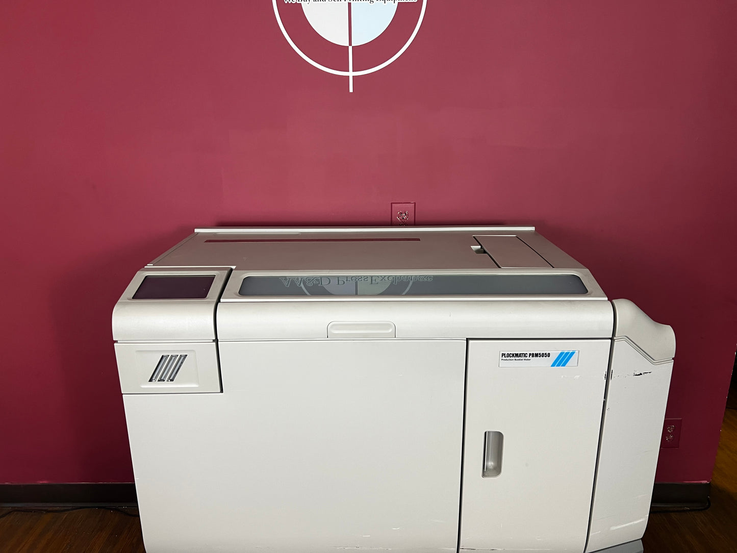 Used Plockmatic 5050 bookletmaker 63k meter close-up of stitching and folding module – AA&D PressExchange
