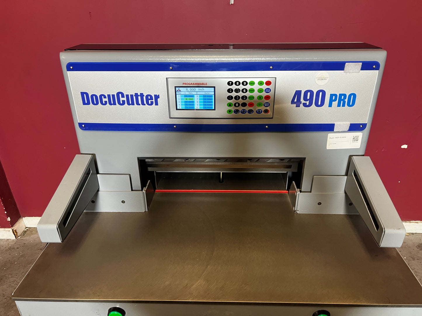 AA&D PressExchange Used Duplo 490 PRO hydraulic paper cutter wide side view showing full machine