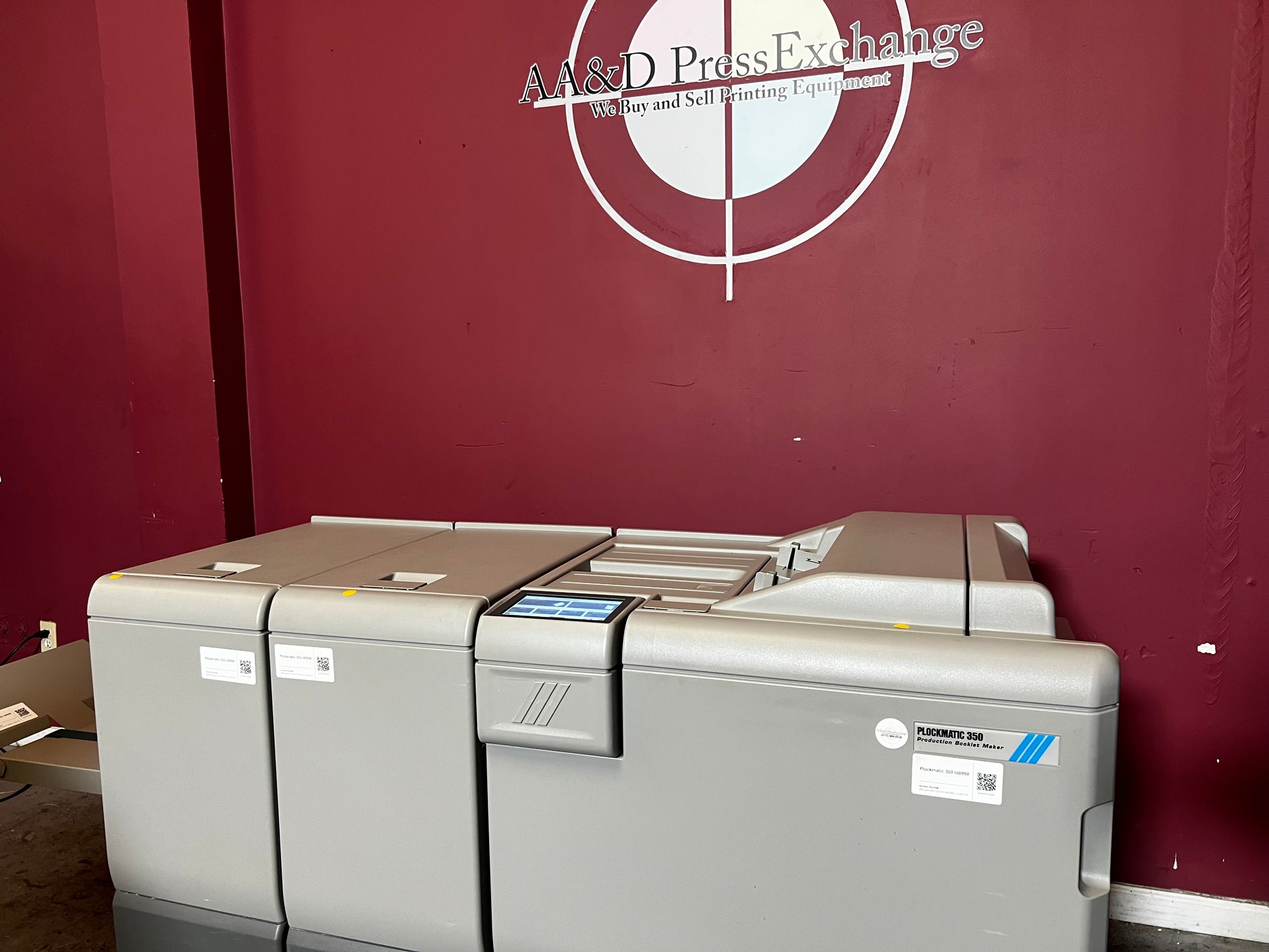 Used Plockmatic 350 200k meter booklet maker rear/angled view of production line connection – AA&D PressExchange
