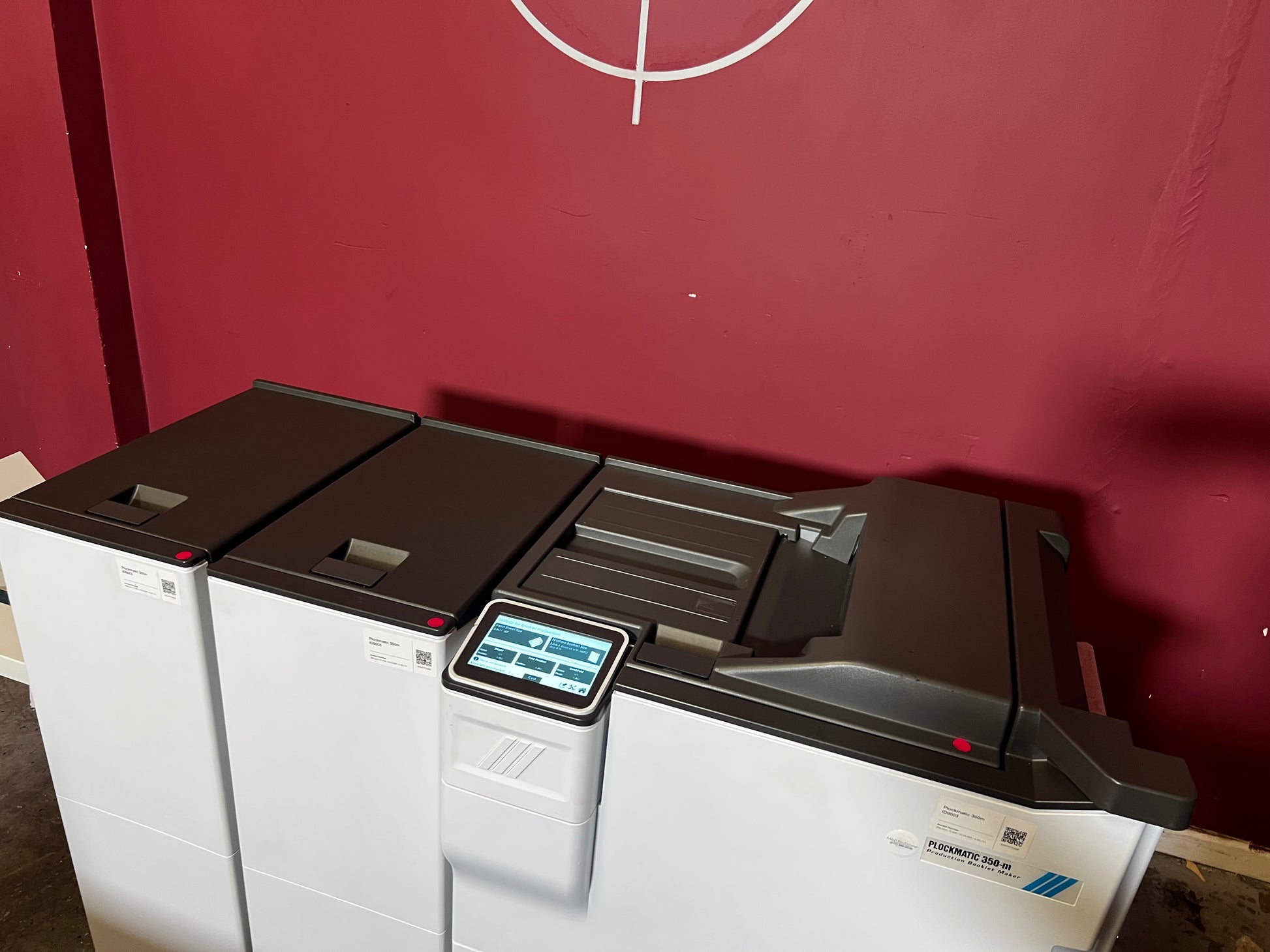 Used Plockmatic 350-M 85k meter booklet maker close-up of stitching and folding section – AA&D PressExchange