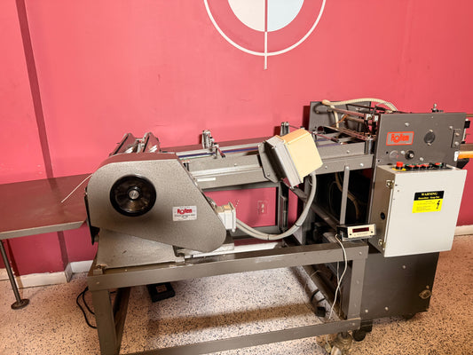 Used 30" Wide Rollem TR perforator scoring slitting pile feeder overview in print finishing shop