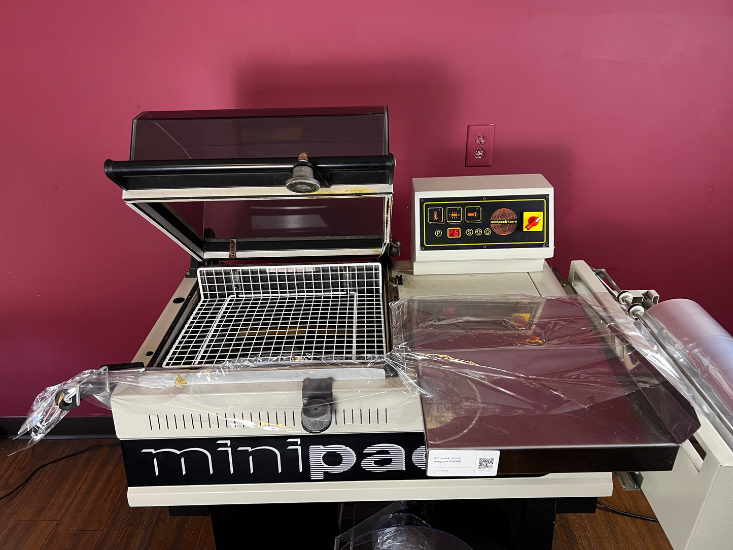 Used Minipack FM-75 Digit chamber shrink wrapper with transport belt | AA&D PressExchange