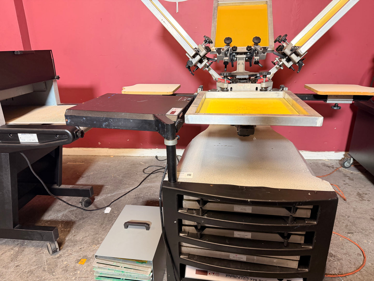 Used Printa 770 Series Screen Printing System side view showing frame and platen setup – AA&D PressExchange