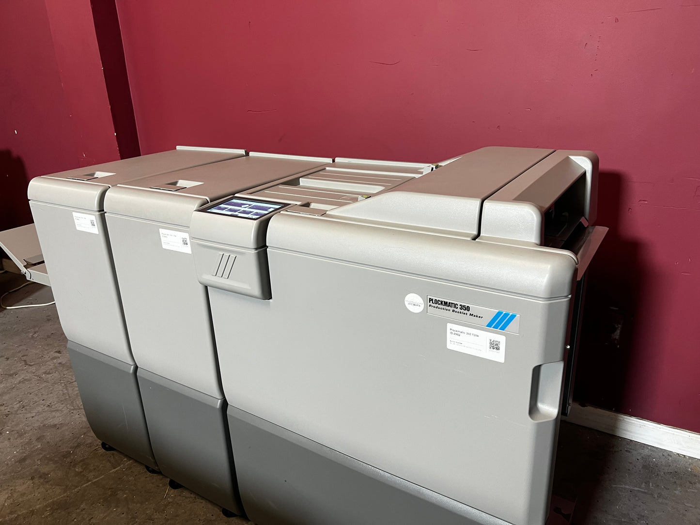 Used Plockmatic 350 bookletmaker 136k front/side view emphasizing saddle stitch function – AA&D PressExchange