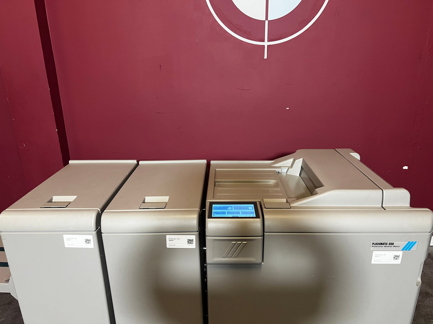 Used Plockmatic 350 booklet maker 60k meter front view in print production environment – AA&D PressExchange
