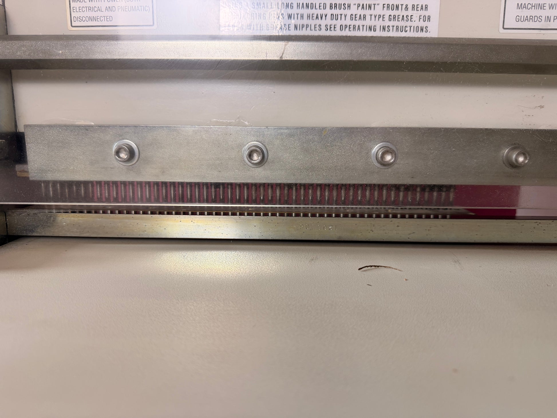 Front angle of used GBC Sickinger MHP 17 showing 5:1 round punching die in use