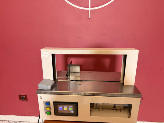 Used Paper Banding Machine GW-02 tabletop banding system with OPP film rolls for sale in industrial packaging use