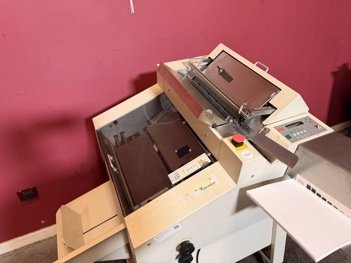 Used GBC DigiCoil automated coil inserter top view of production area – AA&D PressExchange