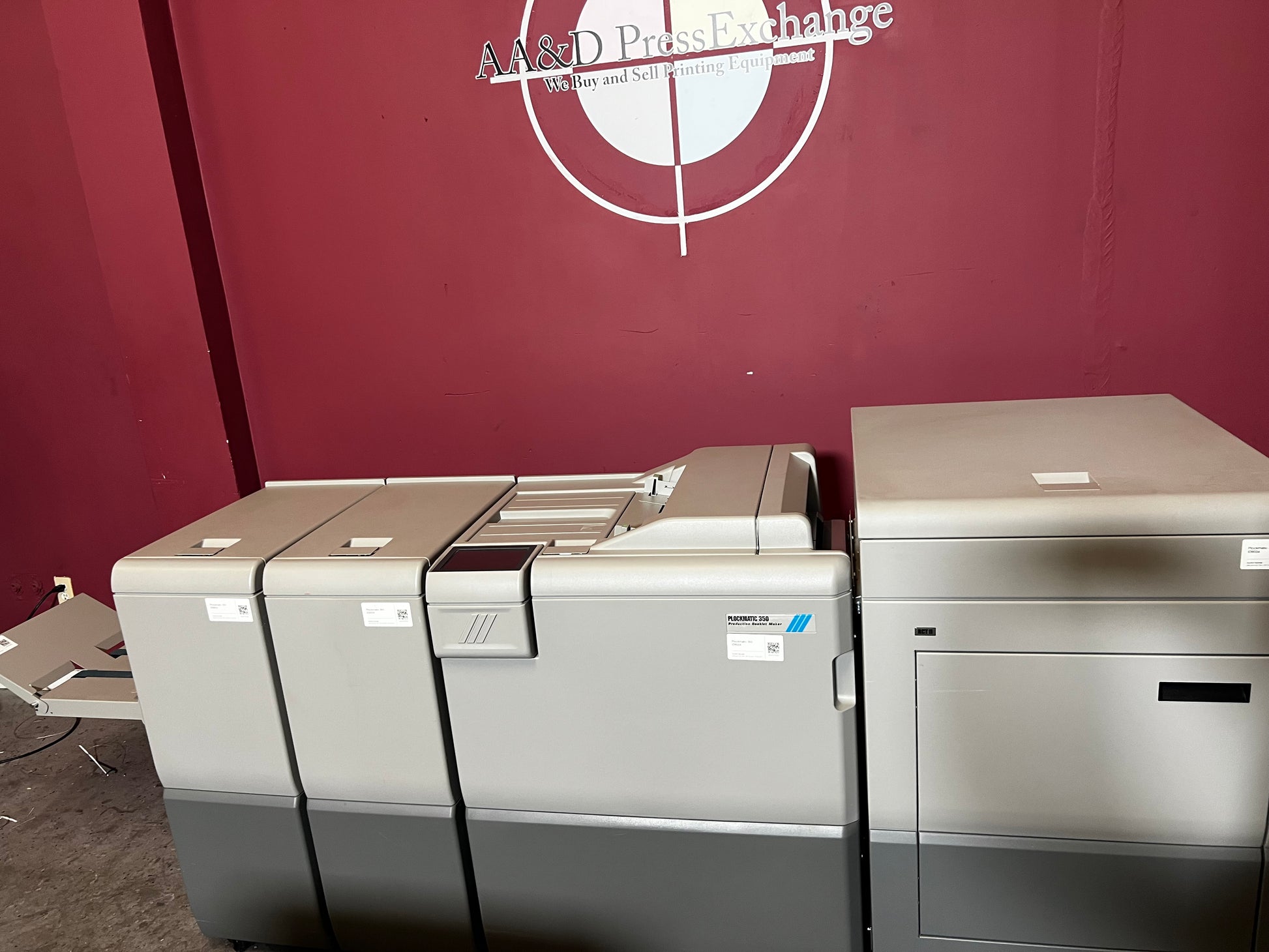 Used Plockmatic 350 70k meter booklet maker front/side view highlighting fold and trim features – AA&D PressExchange