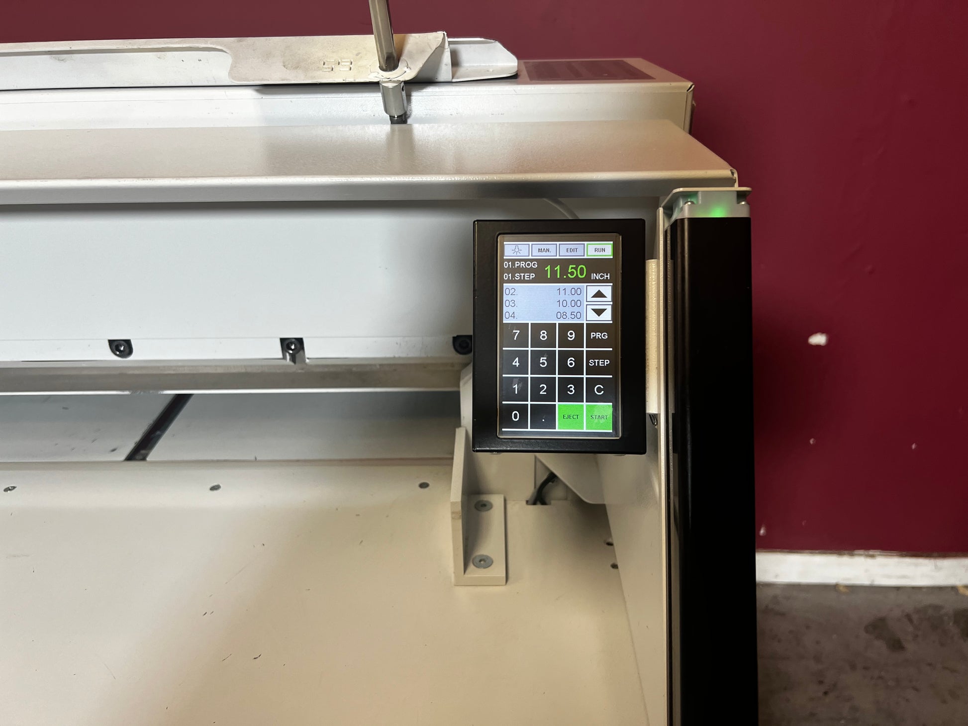 Used Triumph 6660 paper cutter close-up of LCD control panel with VRCut interface – AA&D PressExchange
