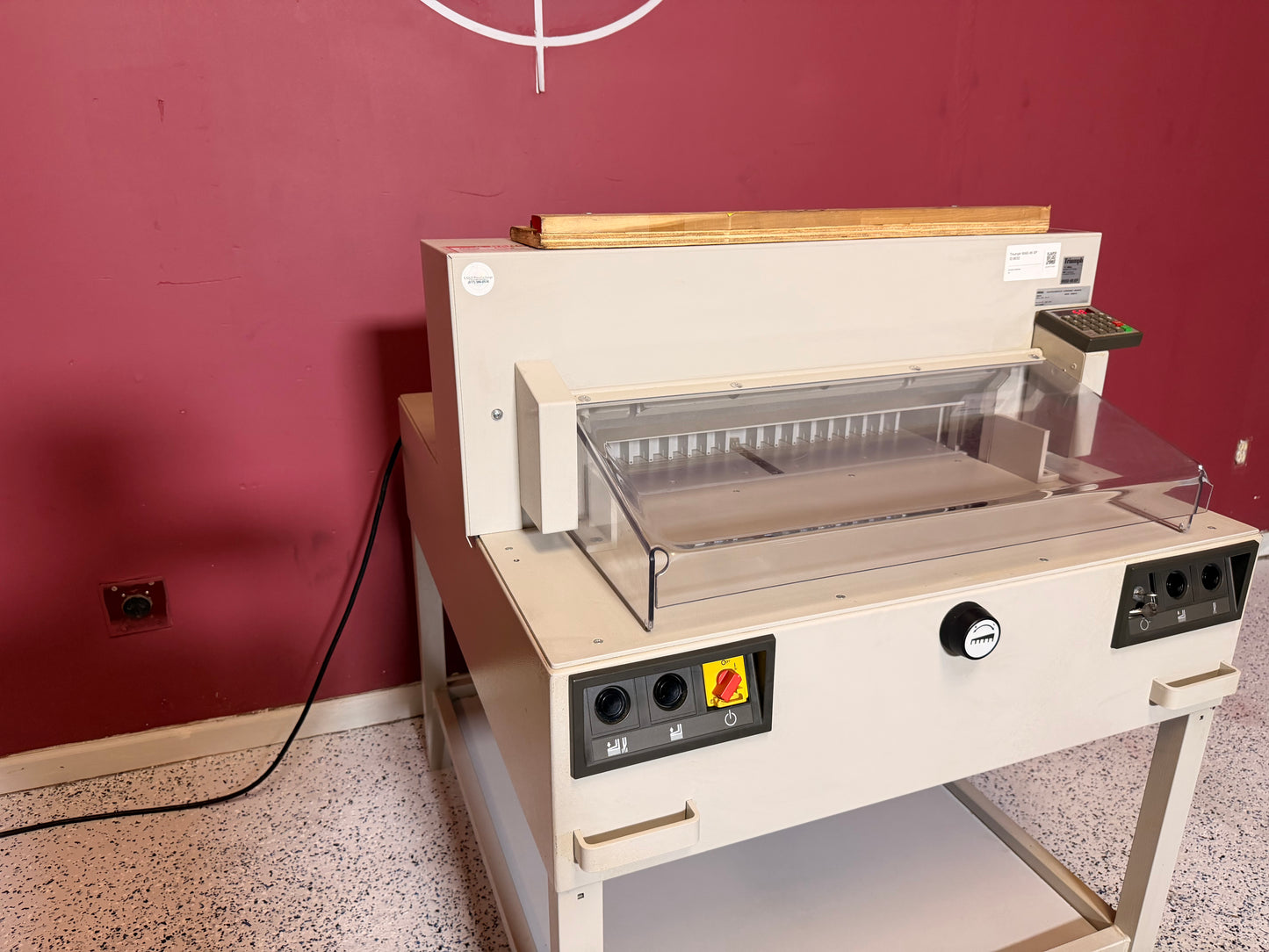 Used Triumph 6550-95 paper cutter with electric clamp and blade drive