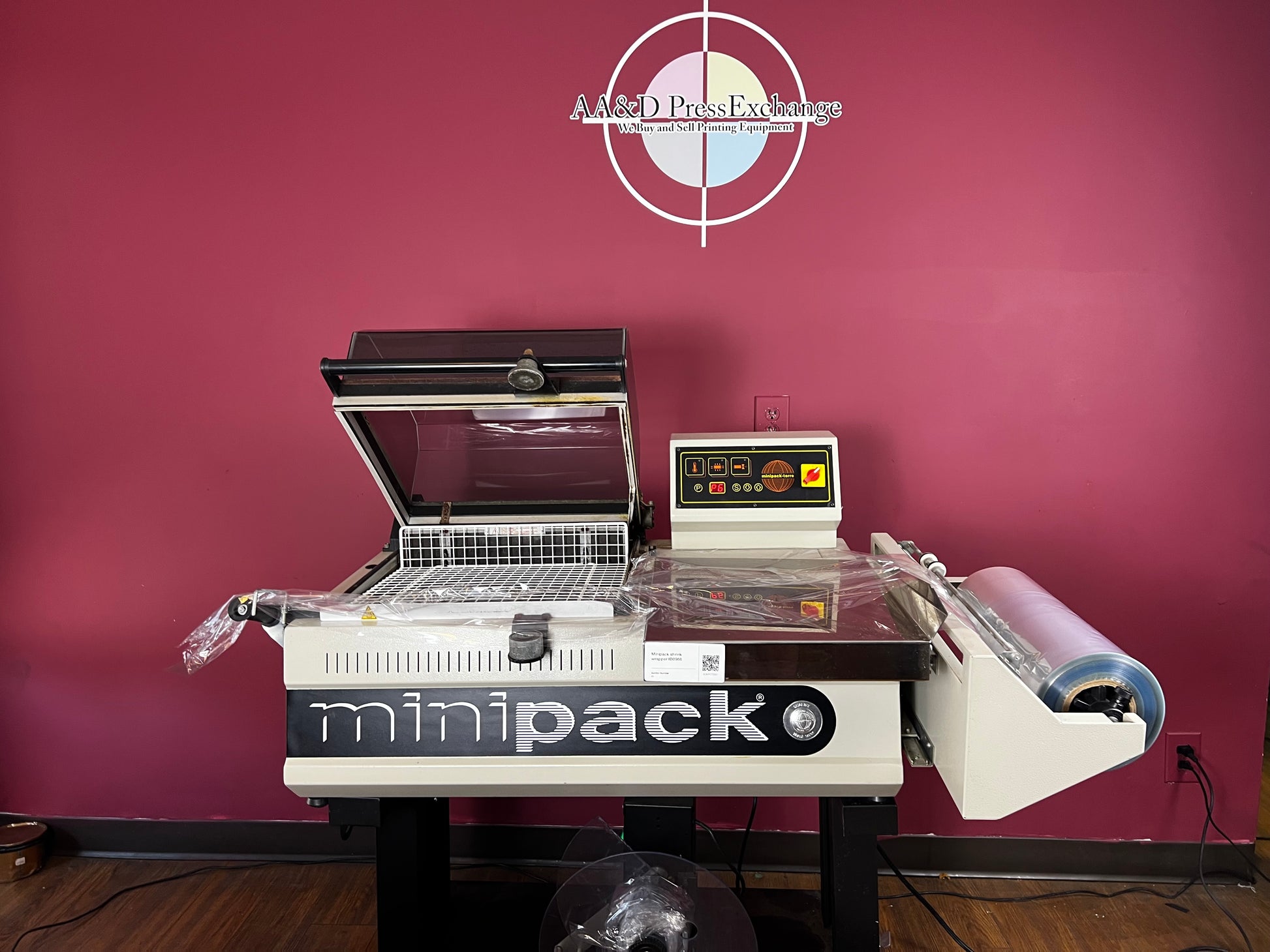 Used Minipack FM-75 Digit shrink wrapping machine on stand | AA&D PressExchange